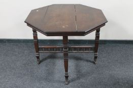 A Victorian oak octagonal occasional table