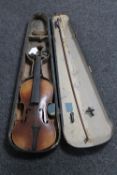 A late 19th century Stradivarius copy violin and bow in case (a/f)