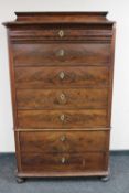 A 19th century continental mahogany seven drawer chest on chest