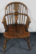 A 20th century beech Windsor armchair