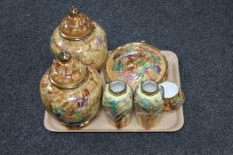 A tray of seven pieces of Hose St.