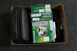 A box of Fujifilm camera, Minolta camera,