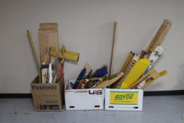 Three boxes of wooden model air craft parts : wings and fuselages