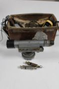 A leather cased theodolite,
