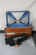 A folding Black & Decker workbench together with a Moto shop scroll saw