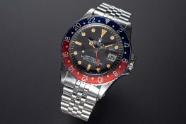 A RARE GENTLEMAN'S STAINLESS STEEL ROLEX OYSTER PERPETUAL GMT MASTER 