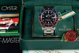 A RARE GENTLEMAN'S STAINLESS STEEL ROLEX OYSTER PERPETUAL DATE GMT MASTER 