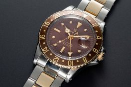 A GENTLEMAN'S STEEL & GOLD ROLEX OYSTER PERPETUAL GMT MASTER 