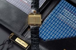 A RARE GENTLEMAN'S 18K SOLID GOLD CORUM ROLLS ROYCE 