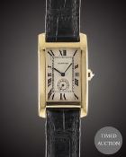 A GENTLEMAN'S SIZE 18K SOLID GOLD CARTIER TANK AMERICAINE WRIST WATCH CIRCA 1990, REF. 811905