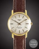 A GENTLEMAN'S 18K SOLID GOLD LONGINES FLAGSHIP AUTOMATIC WRIST WATCH CIRCA 1961, REF. 3404 WITH