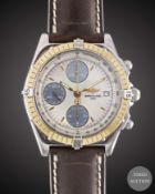 A GENTLEMAN'S SIZE STEEL & GOLD BREITLING CHRONOMAT WRIST WATCH CIRCA 2000s, REF. D13050.1 WITH