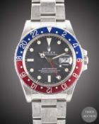 A GENTLEMAN'S STAINLESS STEEL ROLEX OYSTER PERPETUAL GMT MASTER BRACELET WATCH CIRCA 1980s, REF.