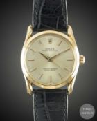 A GENTLEMAN'S 14K SOLID GOLD ROLEX OYSTER PERPETUAL 