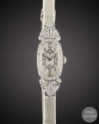 A LADIES SOLID WHITE GOLD & DIAMOND ROLEX COCKTAIL BRACELET WATCH CIRCA 1930s Movement: 15J,