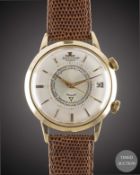 A GENTLEMAN'S 18K SOLID GOLD JAEGER LECOULTRE MEMOVOX AUTOMATIC ALARM WRIST WATCH CIRCA 1960, WITH