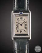 A GENTLEMAN'S STAINLESS STEEL CARTIER TANK BASCULANTE 