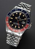 A GENTLEMAN'S STAINLESS STEEL ROLEX OYSTER PERPETUAL GMT MASTER BRACELET WATCH CIRCA 1973, REF. 1675