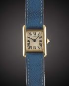 A RARE LADIES 18K SOLID GOLD CARTIER LONDON TANK 