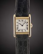 A GENTLEMAN'S SIZE 18K SOLID GOLD CARTIER PARIS TANK NORMALE WRIST WATCH CIRCA 1980s Movement: