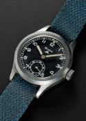 A RARE GENTLEMAN'S STAINLESS STEEL BRITISH MILITARY GRANA W.W.W. WRIST WATCH CIRCA 1945, WITH 