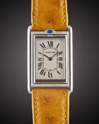 A GENTLEMAN'S STAINLESS STEEL CARTIER TANK BASCULANTE 