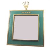 A GILT METAL & ENAMEL ROLEX MIRROR CIRCA 1950s Gilt metal surround with green enamel & gilt Rolex