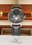 A FINE GENTLEMAN'S 18K SOLID WHITE GOLD BREGUET TRADITION SKELETON POWER RESERVE WRIST WATCH DATED