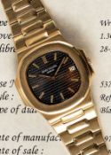 A VERY RARE GENTLEMAN'S 18K SOLID YELLOW GOLD PATEK PHILIPPE NAUTILUS 
