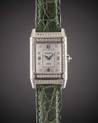 A FINE LADIES 18K SOLID WHITE GOLD & DIAMOND JAEGER LECOULTRE REVERSO WRIST WATCH DATED 1999, REF.
