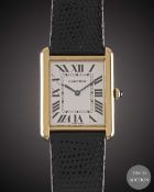 A GENTLEMAN'S LARGE SIZE STEEL & SOLID GOLD CARTIER TANK SOLO WRIST WATCH DATED 2007, REF. 2742 WITH