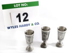 Three Pewter Commemorative Goblets of Conical Form on Column Stem with Fluted Base with Relief