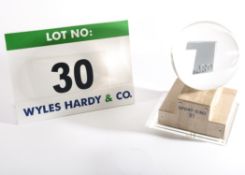 A Trophy in the form of a Clear Plastic Globe, approx. 150mm dia., containing a Cast Metal Plate