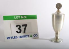 A Metal Trophy in the form of a Cup bearing the inscribed words Deutsche Jugendmeister 1982 Juniuren