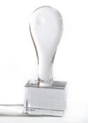 A KOSTA BODA Engraved Glass Likeness of a Tennis Racquet mounted on a Glass Block, the Racquet