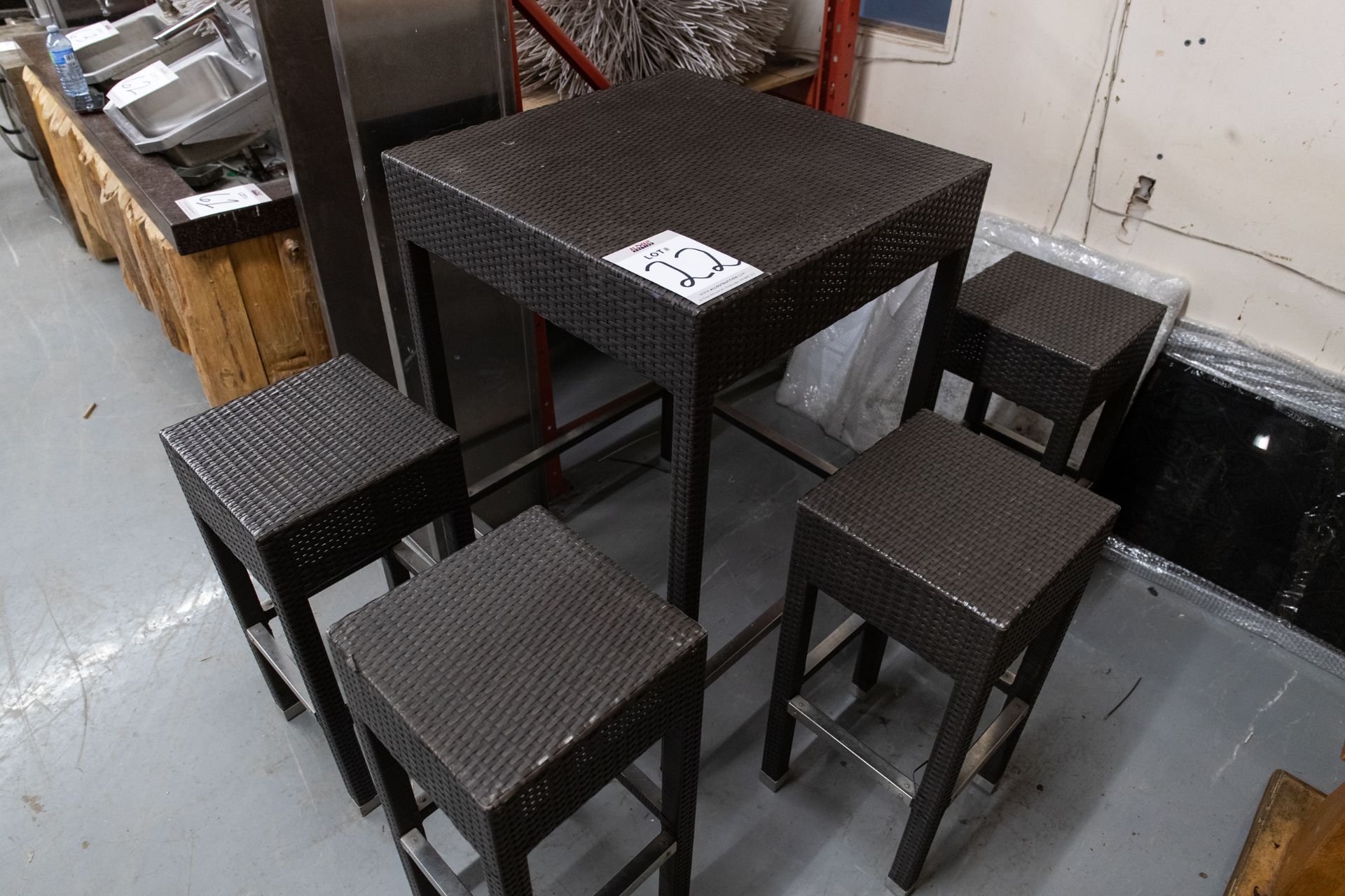 OUTDOOR FAUX WICKER HIGHTOP TABLE WITH 4 STOOLS H- 43" W- 29" BY 29"