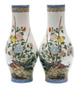 A pair of Chinese famille rose slender baluster vases: of eggshell porcelain type,