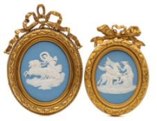 A Wedgwood blue jasper oval plaque and one similar: the first sprigged in white with 'The Three