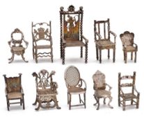 A collection of Dutch silver miniature furniture,
