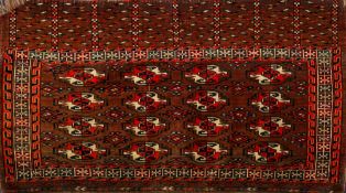 A Yomud Juval:, the shaded wine field with four rows of quartered geometric medallions,