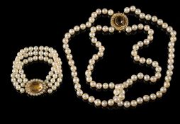 A cultured pearl two-strand necklace on 9ct gold,