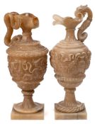 A large 19th century alabaster ewer of neo-classical design: with shell-shaped spout held in the