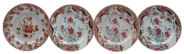 A set of three Chinese famille rose plates and one similar: painted with peonies,