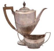 A Victorian silver coffee pot, maker Goldsmiths & Silversmiths Co, Sheffield,