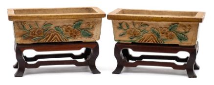 A pair of Chinese sancai-glazed tileworks jardinieres: each of rectangular form with one side