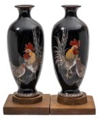 A pair of Japanese cloisonne vases: of ovoid outline, decorated with cockerels and hens,