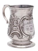 A George II silver mug, maker John Langlands I, Newcastle 1757: inscribed, of baluster form,