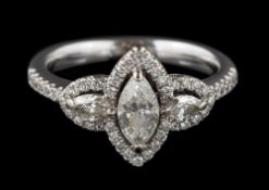 An 18ct white gold and marquise-shaped diamond 'halo' cluster ring: with central marquise-cut