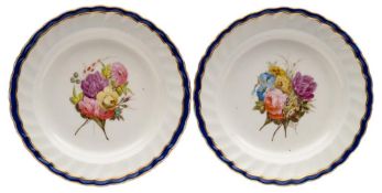 A pair of Derby plates: each painted in the manner of William Billingsley with a floral bouquet