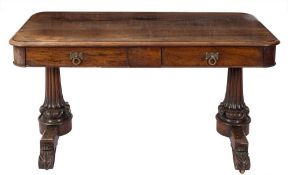 A William IV rosewood rectangular library table:, the top with rounded corners and a moulded edge,